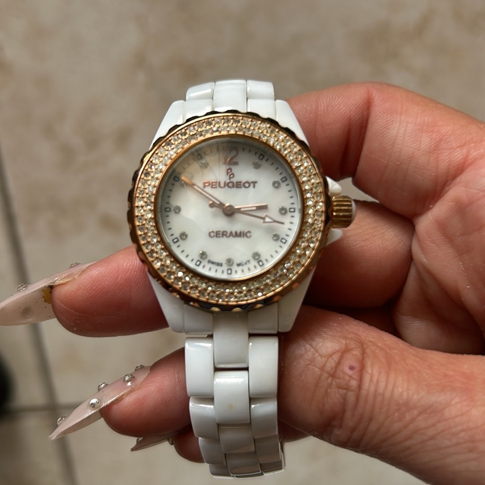 Peugeot white ceramic crustal face rose gold watch never worn rhinestones dials